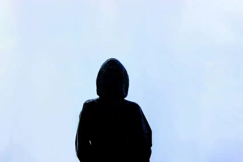 A mysterious hooded figure