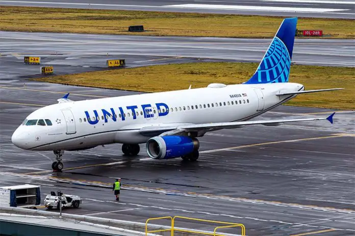 A United Airlines plan on the ground on an airport runway