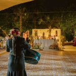 Mariachi serenades bride and groom at wedding. Mexican wedding traditions