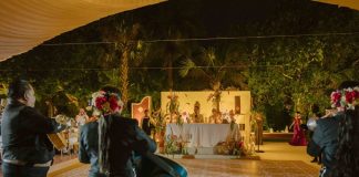 Mariachi serenades bride and groom at wedding. Mexican wedding traditions