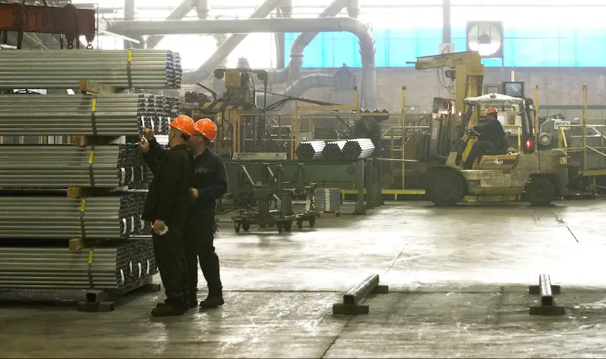 Workers at a steel factory.