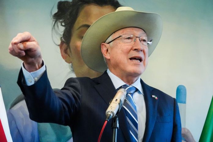 U.S. Ambassador to Mexico Ken Salazar gestures while speaking at a podium