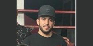 CJNG drug lord Cristian "El Guacho" Gutiérrez Ochoa poses for a photo holding a rooster