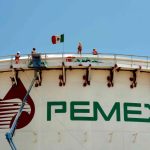 A Pemex storage facility with a Mexican flag