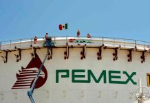 A Pemex storage facility with a Mexican flag