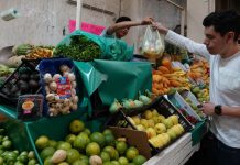 A person shops at a local market in Mexico City.