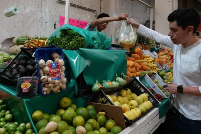 A person shops at a local market in Mexico City.