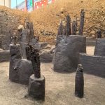 The old wooden posts of an pre-Columbian dock are visible in the hole of an archeological dig in Mexico City's Chapultepec Park