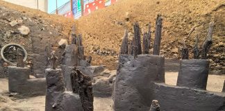 The old wooden posts of an pre-Columbian dock are visible in the hole of an archeological dig in Mexico City's Chapultepec Park