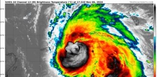 Multicolored weather map showing an image of Hurricane Rafael