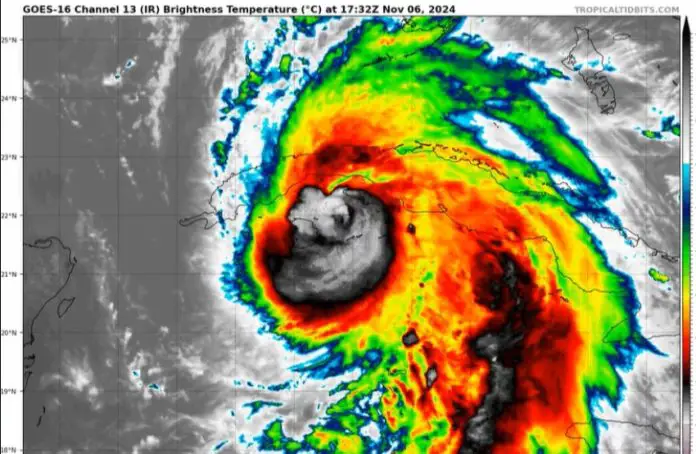 Multicolored weather map showing an image of Hurricane Rafael