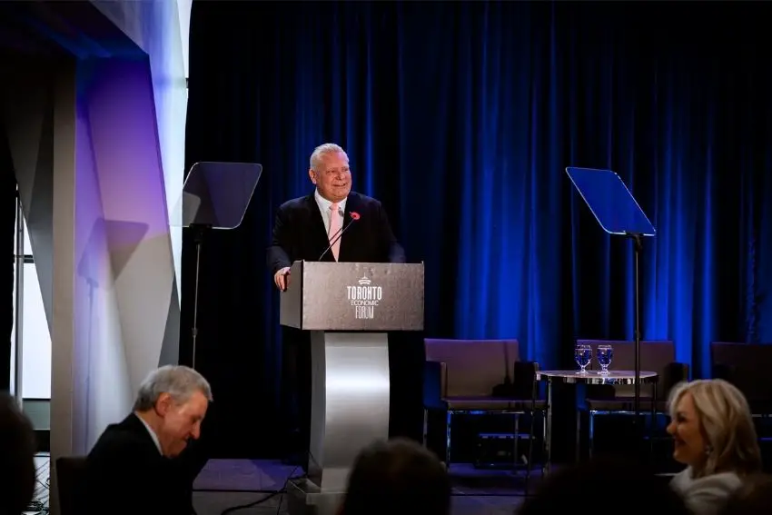 Ontario Premier Doug Ford at a podium onstage during 2024's Toronto Economic Forum