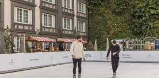 Two people ice skating at the Four Seasons in Mexico City