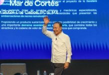 Sonora Governor Alfonso Durazo Montaño waves to audience at Mar de Cortes Forum in Los Cabos, Mexico