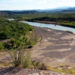 The Rio Grande river winding into the mountains of Big Bend National Park in Texas