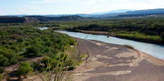 The Rio Grande river winding into the mountains of Big Bend National Park in Texas