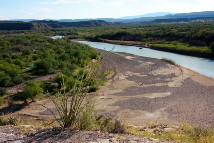 The Rio Grande river winding into the mountains of Big Bend National Park in Texas