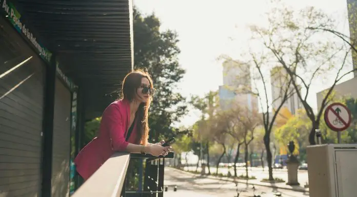 A single woman looks out over Mexico City.