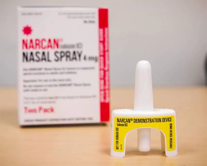 A Narcan box and nasal spray device