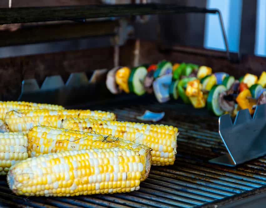 Fine pieces of corn on top of a grill