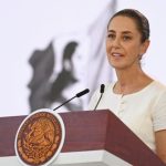 President Sheinbaum at the podium at her Monday morning mañanera