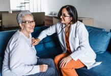 A doctor cares for an elderly patient. Healthcare in Mexico podcast