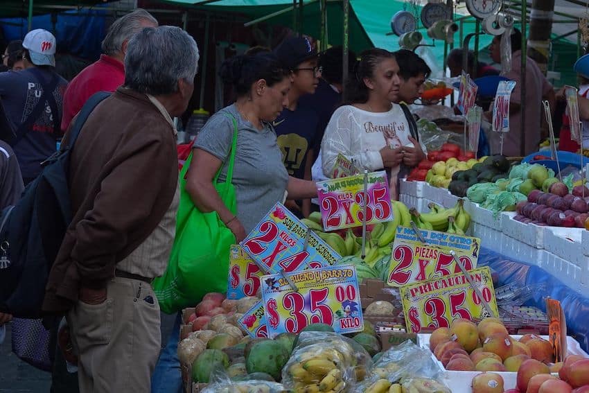 People buying fruit and vegetables in Mexico