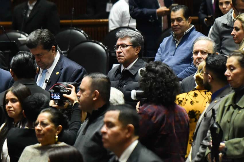 Group of federal deputies sitting in session in Mexico's Chamber of Deputies in Mexico City