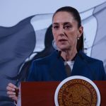 Mexico's President Claudia Sheinbaum at her daily press conference in front of the presidential podium