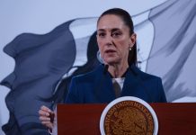 Mexico's President Claudia Sheinbaum at her daily press conference in front of the presidential podium