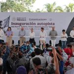 Mexico's President Claudia Sheinbaum cutting a ribbon to open the completed Guadalajara-Puerto Vallarta highway