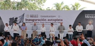 Mexico's President Claudia Sheinbaum cutting a ribbon to open the completed Guadalajara-Puerto Vallarta highway