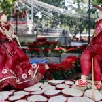 Dancers sculpted out of radishes as part of Oaxaca's Night of the Radishes