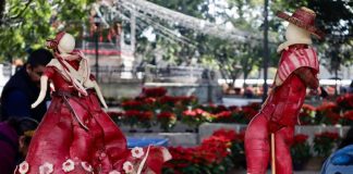 Dancers sculpted out of radishes as part of Oaxaca's Night of the Radishes
