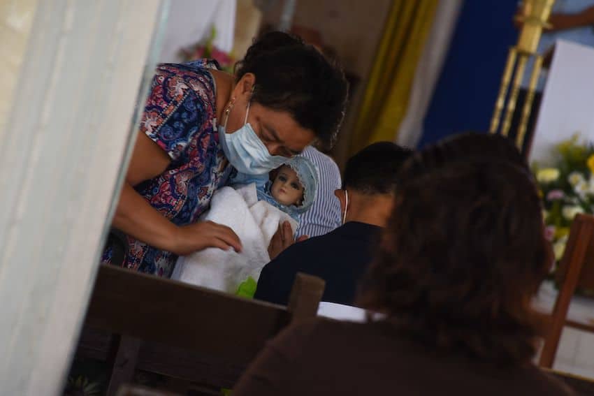 A baby Jesus doll at a mass in Mexico