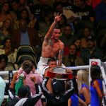 Mexican Gabriel Gollaz Valenzuela celebrates victory over Australian Steve Spark, during a boxing match held at the Akron Stadium in Zapopan.