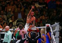 Mexican Gabriel Gollaz Valenzuela celebrates victory over Australian Steve Spark, during a boxing match held at the Akron Stadium in Zapopan.