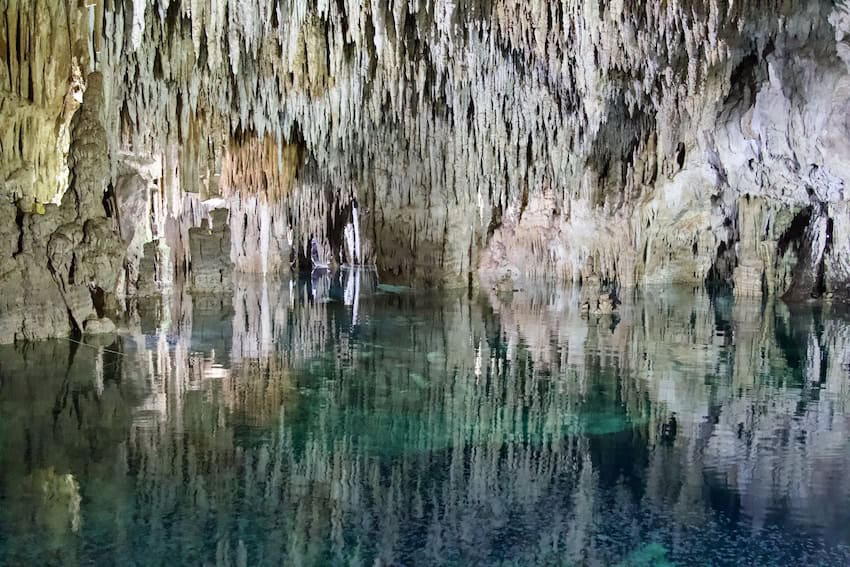 Stalactites hanging from the ceiling in the Aktun Chen cave system.