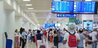 People at Felipe Carrillo Puerto Airport in Tulum, Quintana Roo.