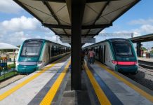 Two trains at a Maya Train station