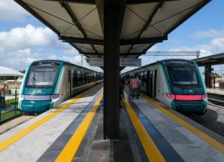 Two trains at a Maya Train station