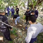 Chiapas authorities examine a clandestine grave