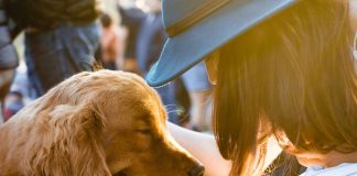 A woman and her golden retriever