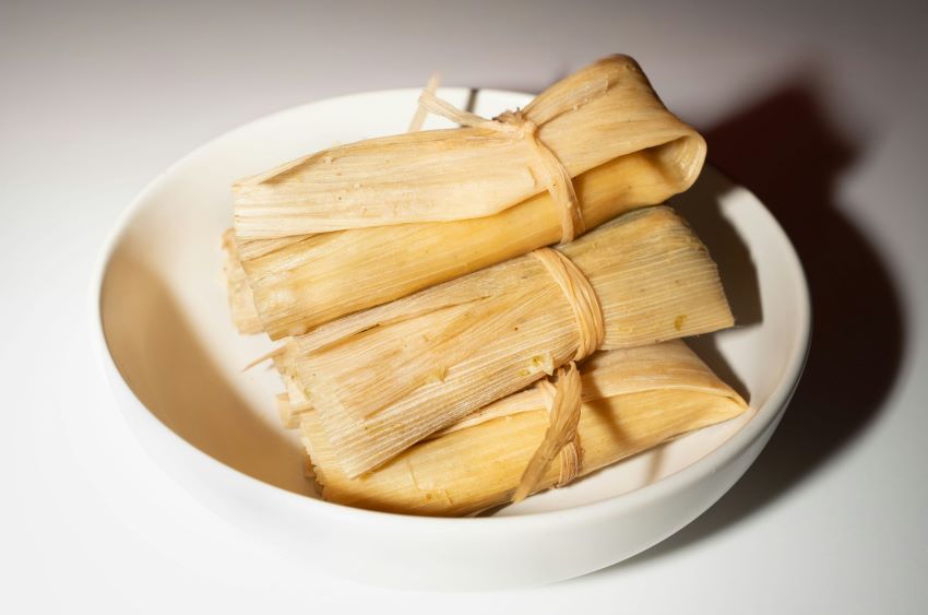 A set of tamales in a bowl