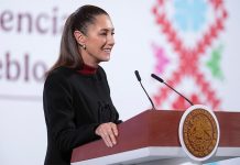 Mexican President Claudia Sheinbaum stands at a podium at her morning press conference, where she discussed a recent New York Times report on fentanyl production in Sinaloa