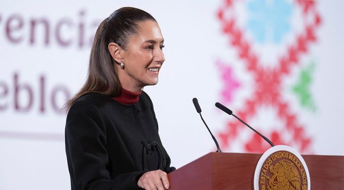 Mexican President Claudia Sheinbaum stands at a podium at her morning press conference, where she discussed a recent New York Times report on fentanyl production in Sinaloa