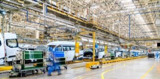 Chassis and machinery inside a car factory
