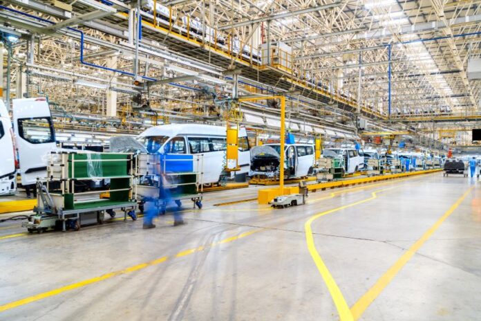 Chassis and machinery inside a car factory