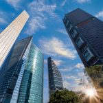 A cluster of skyscrapers climbing into a blue sky in Mexico's business district in Mexico City