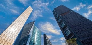 A cluster of skyscrapers climbing into a blue sky in Mexico's business district in Mexico City